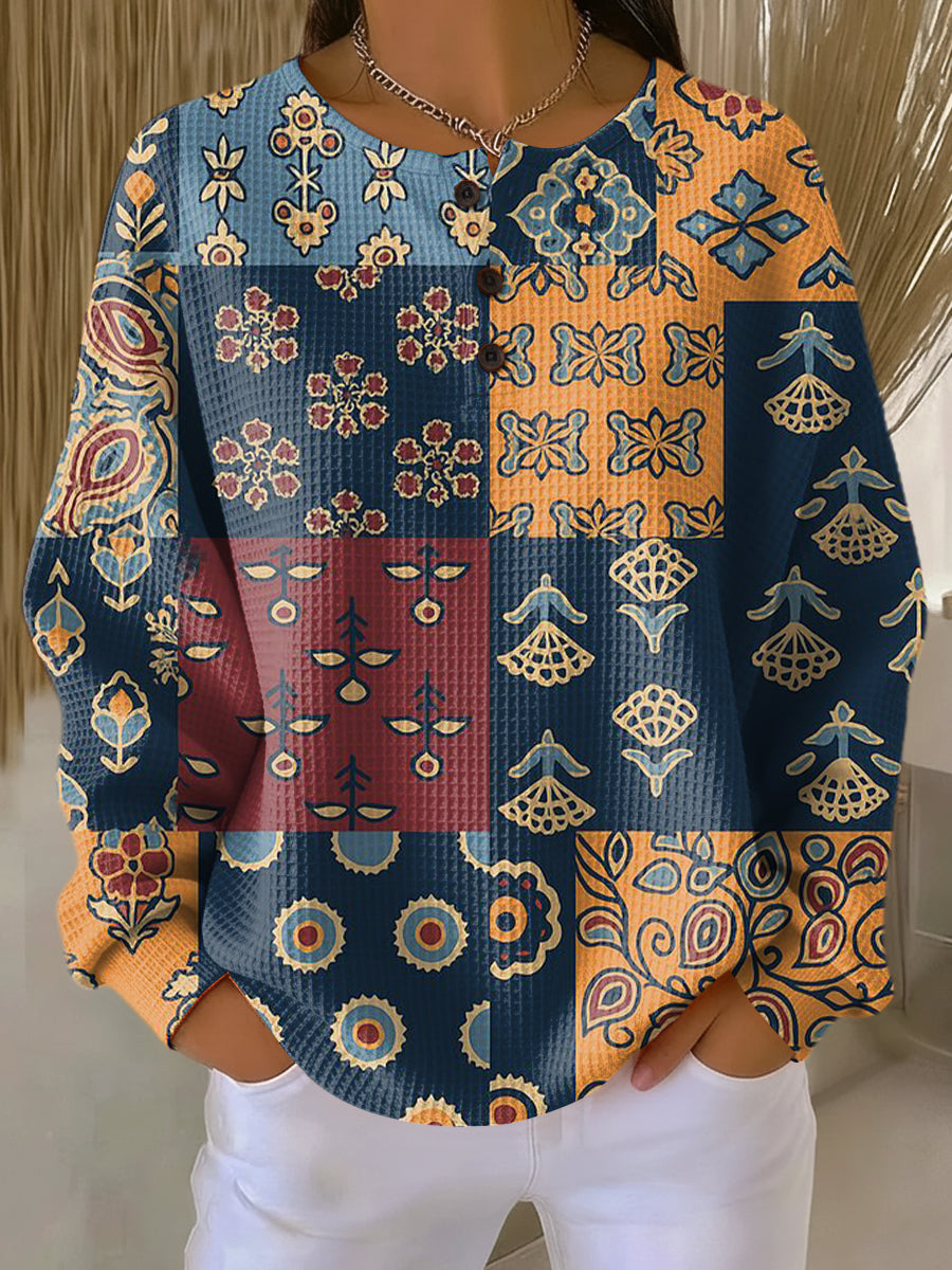 Anika | Genser med etnisk rutemønster og blomstertrykk